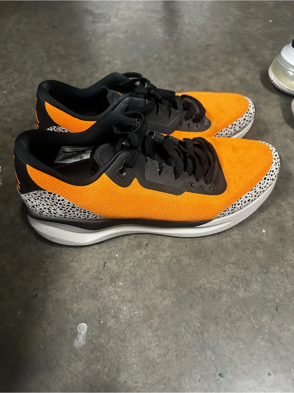 Jordan Men's Orange and Black Low-Top Sneakers with Speckle Accent